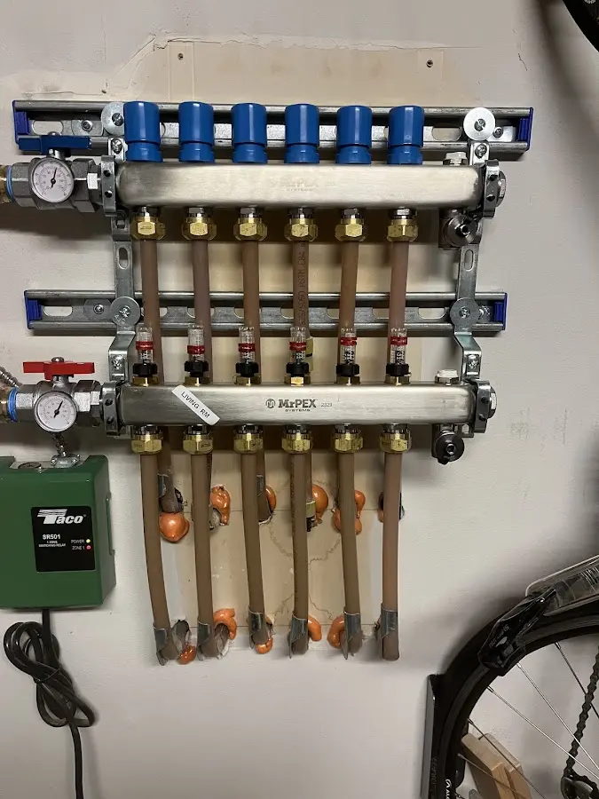 Plumber performing Leak Detection at a residential property in Newton